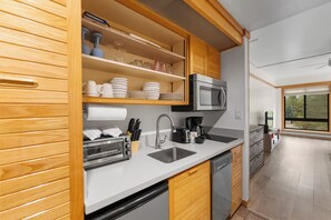 Microwave, stovetop, dishwasher, coffee/tea maker