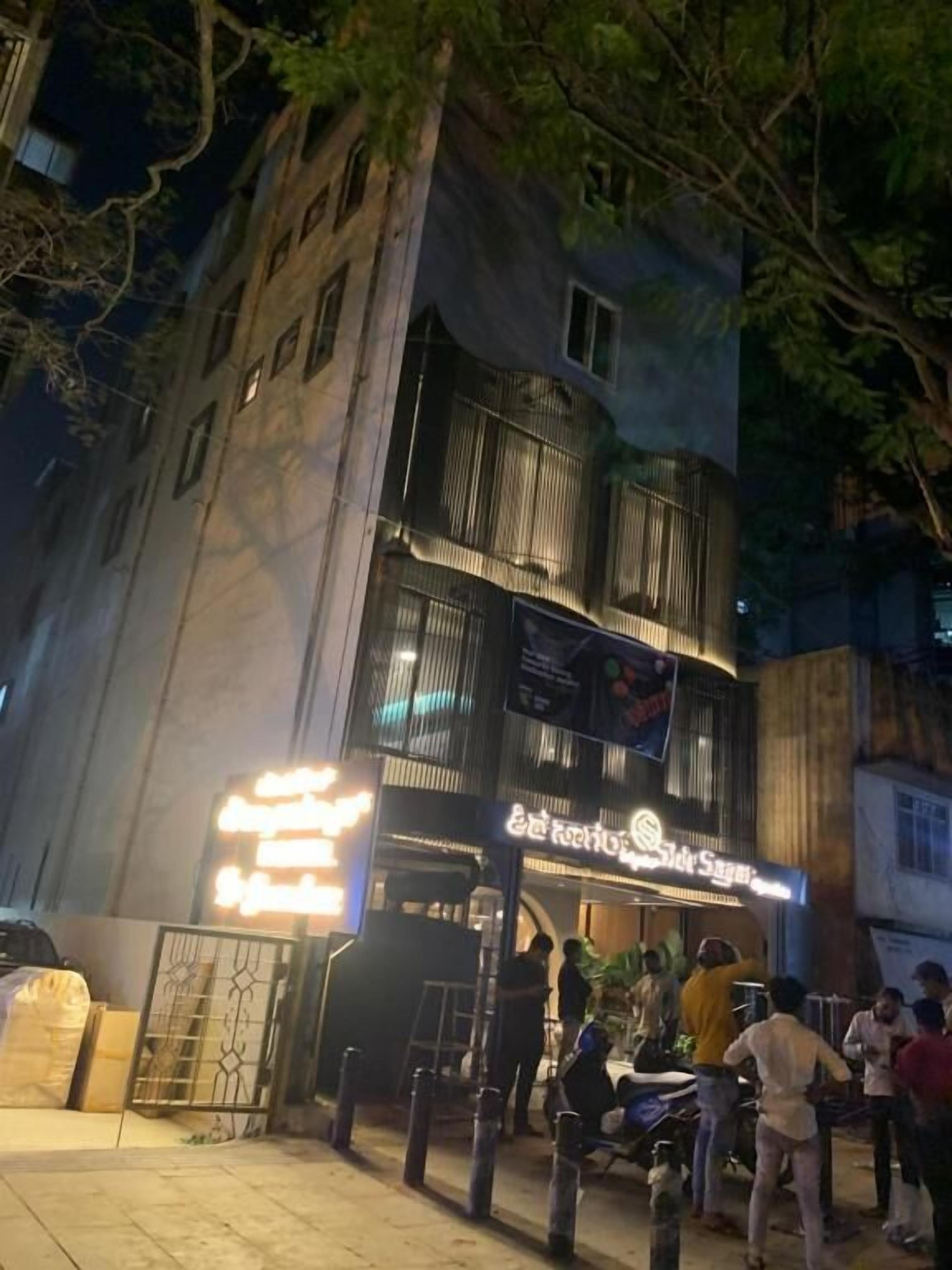 A building with a sign that reads "The Royal Hotel."