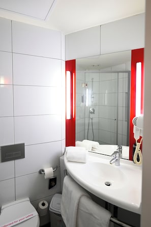 Shower, eco-friendly toiletries, hair dryer, slippers