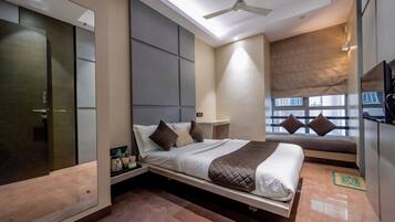 Deluxe Double Room | In-room safe, desk, laptop workspace, blackout curtains