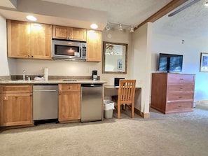Microwave, stovetop, dishwasher, coffee/tea maker