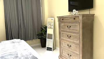Appartement Confort, patio | Rideaux d’obscurcissement, fer et planche à repasser