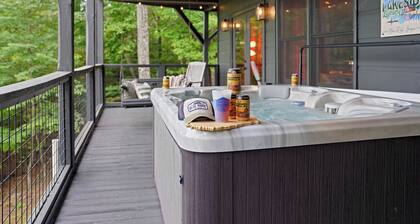 Spacious Cabin with Fire Pit, Hot Tub & Game Room!