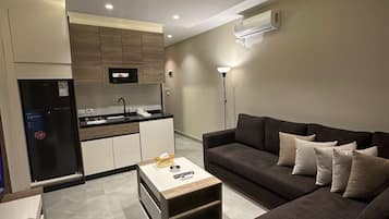 Apartamento, 1 quarto, acessível, para fumantes | Sala de estar