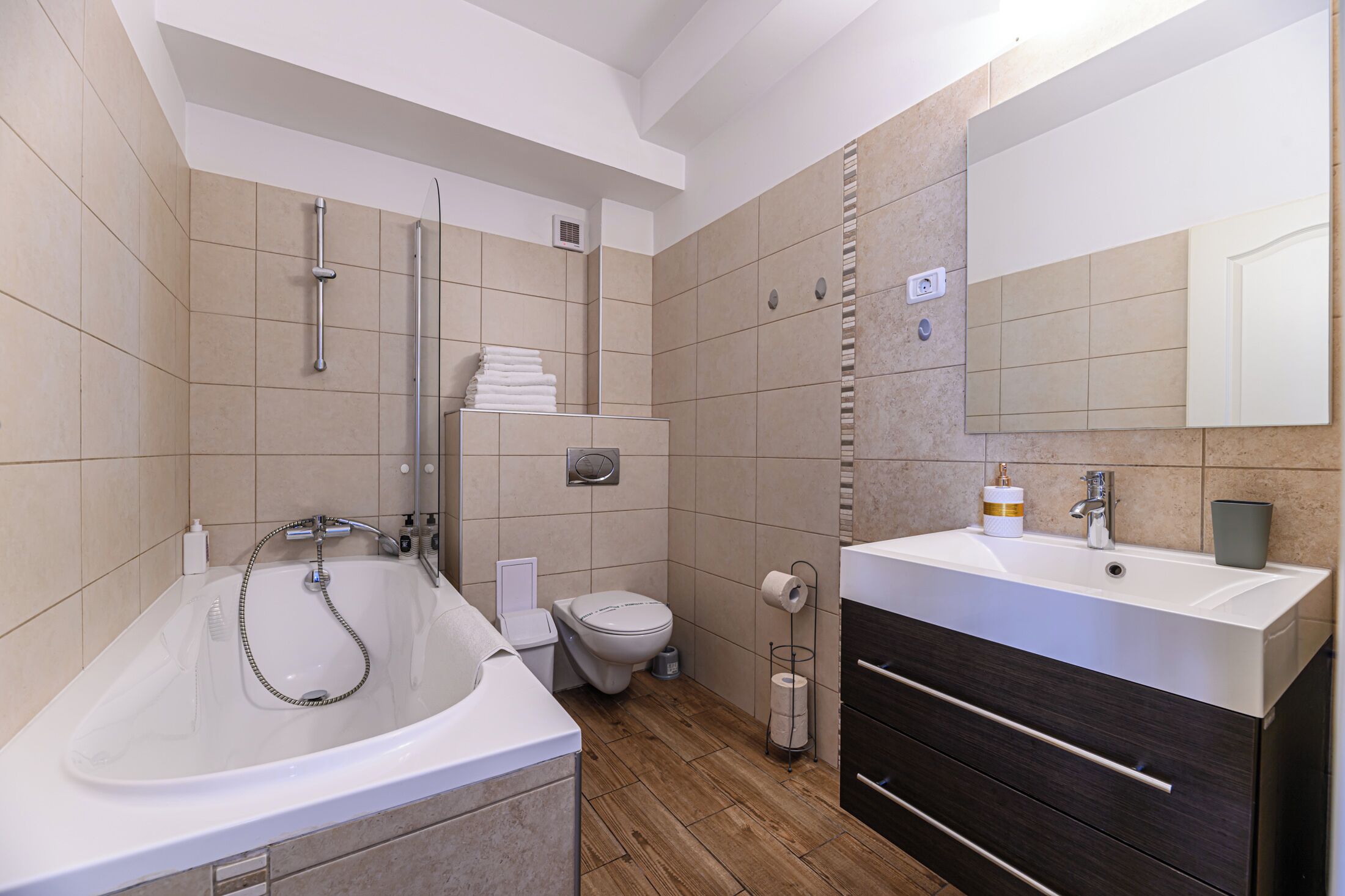 Hair dryer, slippers, towels, soap