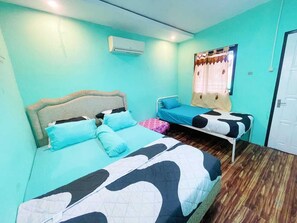 Family Twin Room, 2 Bedrooms, Non Smoking, Air conditioning | Individually decorated, individually furnished, desk, laptop workspace