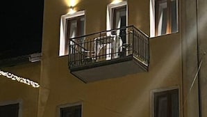 A multi-story building with balconies and windows. - La rosa dei Pepoli (Castiglione dei Pepoli)