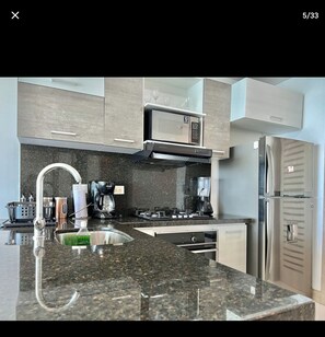 Fridge, microwave, oven, stovetop