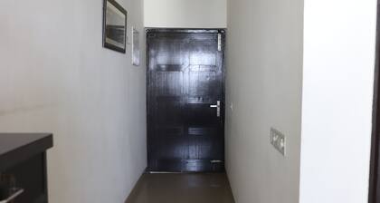 Charming 2-bedroom apartment with WiFi, AC in enchanting Noida, Free Parking