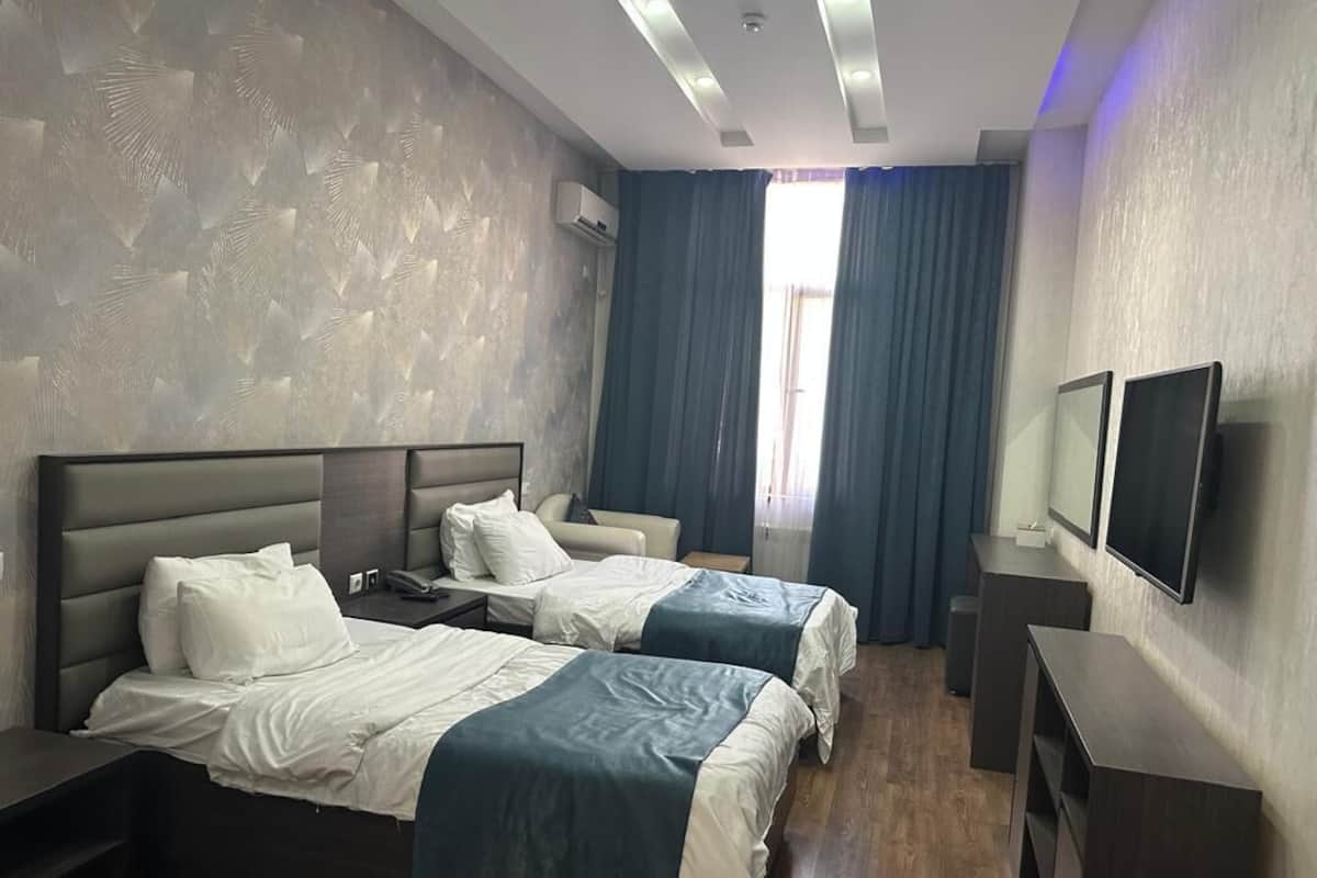 Luxury Twin Room, Courtyard View | In-room safe, desk, blackout drapes, soundproofing