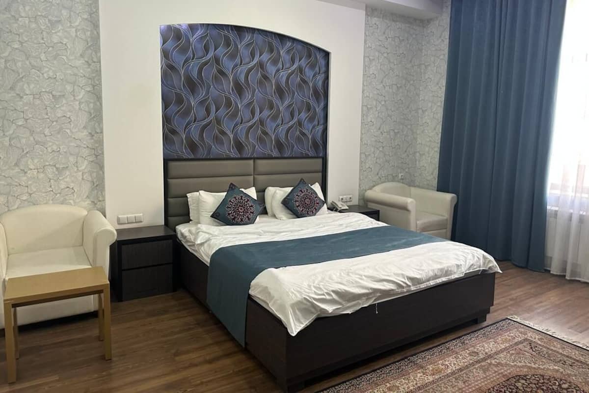 Luxury Suite, Courtyard View | In-room safe, desk, blackout drapes, soundproofing