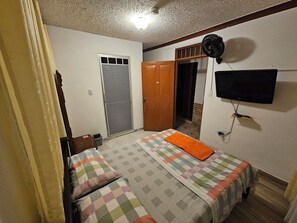 1 bedroom, desk, iron/ironing board, travel crib