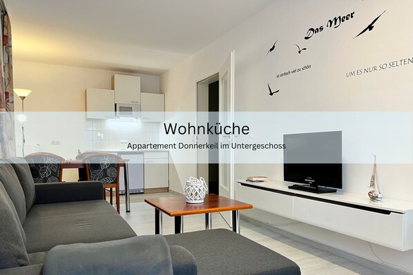 Appartement Standard | Aire de séjour | Téléviseur