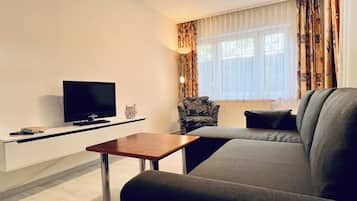 Appartamento Standard | Area soggiorno | TV