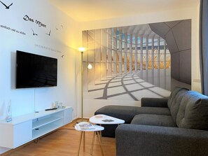 Comfort appartement | Woonruimte | Een televisie