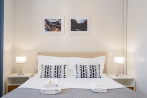 2 habitaciones, tabla de planchar con plancha y cuna de viaje 