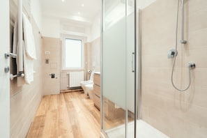 Elite Room, City View | Bathroom | Shower, hair dryer, towels, soap