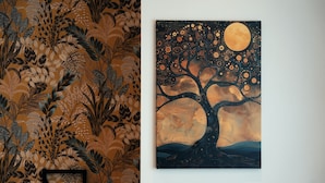 A painting of a tree with a full moon on a wall. - Casa Mia SanPietro (Rome)