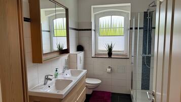 Hair dryer, towels, soap, toilet paper