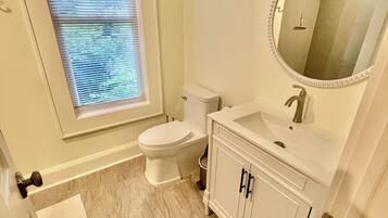 Shower, towels, soap, toilet paper