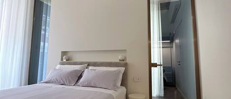 Deluxe Triple Room, Balcony, City View | Desk, laptop workspace, free WiFi