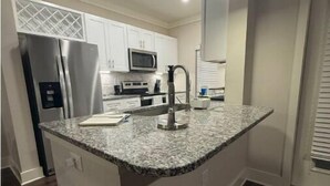 Unclassified image, 4 of 14, button - Luxurious Plush Apartment (McDonough)