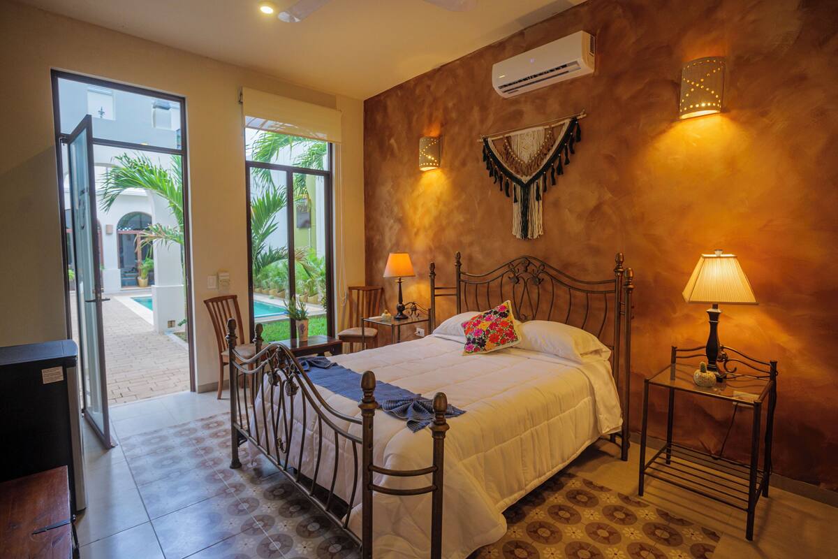 Junior Suite, Pool View | Minibar, WiFi (free), bed sheets