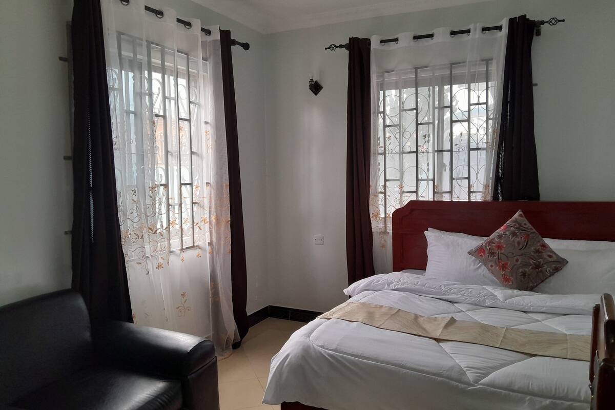 Deluxe Double Room, Garden View | Desk, laptop workspace, free WiFi