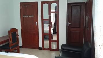 Deluxe Double Room, Garden View | Desk, laptop workspace, free WiFi
