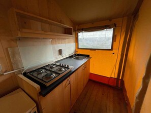 Fridge, microwave, stovetop, coffee/tea maker