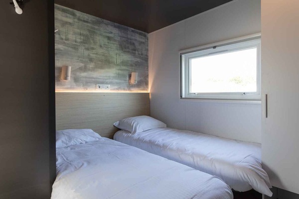 Bedroom of Holiday Park Klein Strand - Luxury Chalet 6p