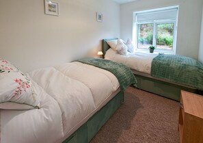 3 slaapkamers, een strijkplank/strijkijzer, beddengoed