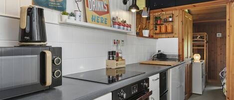 Fridge, microwave, toaster, cookware/dishes/utensils