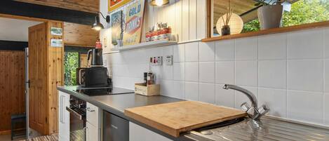 Fridge, microwave, toaster, cookware/dishes/utensils