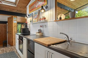 Fridge, microwave, toaster, cookware/dishes/utensils