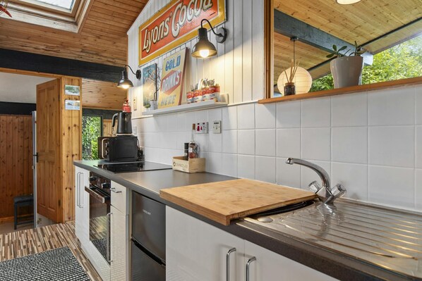 Fridge, microwave, toaster, cookware/dishes/utensils