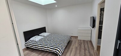 Air-conditioned house in the center of town on a quiet street close to all amenities.