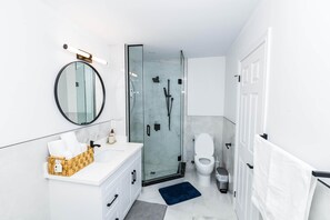 Hair dryer, towels, soap, shampoo