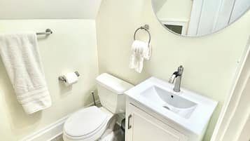 Hair dryer, towels, soap, toilet paper