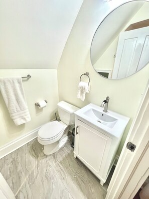 Hair dryer, towels, soap, toilet paper