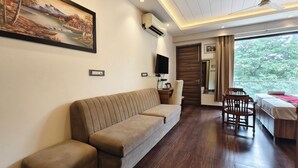 Luxury Double Room | Living area - 1 Million Suites (Gurugram)