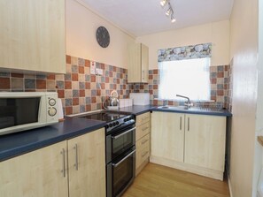 Fridge, microwave, toaster, cookware/dishes/utensils