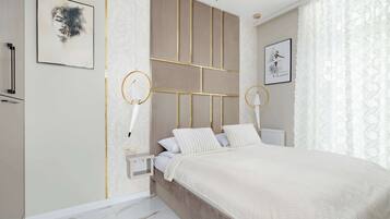 1 dormitorio, tabla de planchar con plancha, wifi y ropa de cama