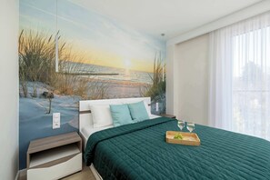1 slaapkamer, een strijkplank/strijkijzer, wifi, beddengoed