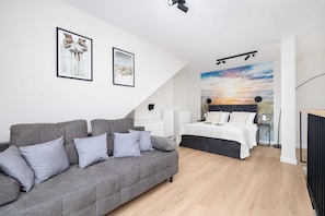 1 habitación, tabla de planchar con plancha, cuna de viaje y wifi 