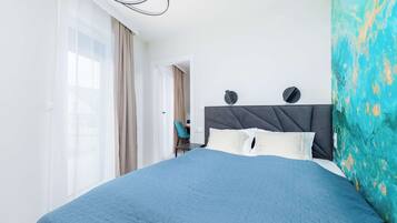 1 habitación, tabla de planchar con plancha, cuna de viaje y wifi