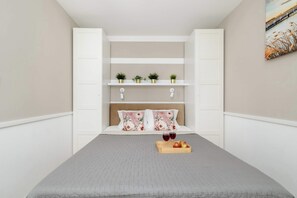1 habitación, tabla de planchar con plancha, wifi y ropa de cama 