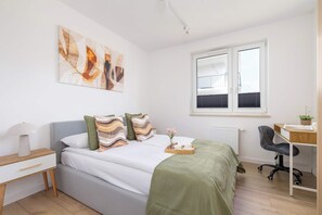 2 bedrooms, desk, iron/ironing board, travel crib