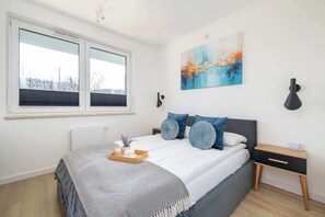 2 bedrooms, desk, iron/ironing board, travel crib