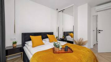 2 bedrooms, desk, iron/ironing board, travel crib